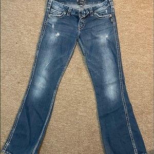 Silver twisted jeans. Boot cut, some wear on bottoms. Awesome jeans!